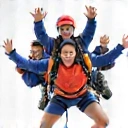 Icon representing a diverse and friendly community of skydivers.